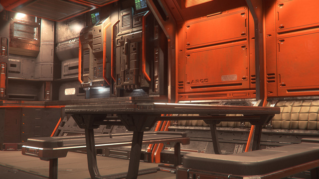 Image: An orange table with orange benches against an orange wall, with a compact coffee/food station in the background.  A Warning-like sticker on the wall admonishes: 'PLEASE KEEP CLEAN'